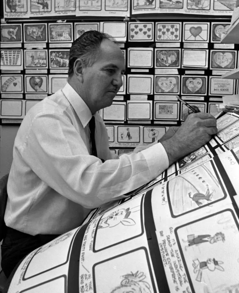 Production supervisor Carl Urbano works over a storyboard in 1967