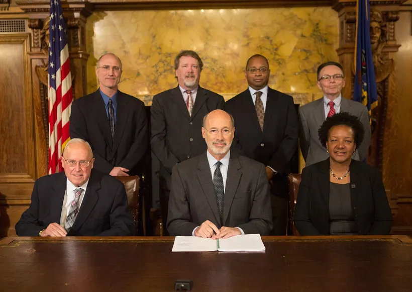 A governor signing state legislation into law